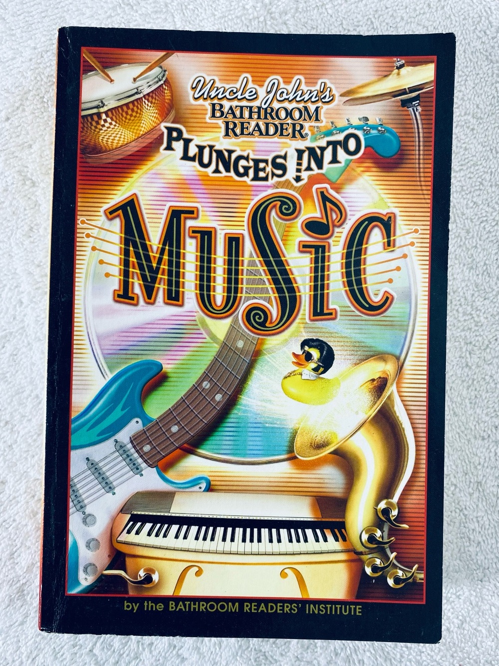 5/$35 Bathroom Readers Institute Uncle John’s Plunges Into Music Bathroom Reader